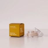 Routine Bonita Applebom natural deodorant mini - golden cardboard box beside open glass jar showing cream deodorant