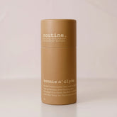 Routine Bonnie n’ Clyde deodorant stick in brown cardboard tube on neutral background showing label