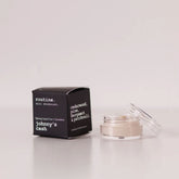 Routine Johnny's Cash baking soda free mini deodorant showing black cardboard packaging next to open glass jar containing cream-coloured natural forest-scented deodorant