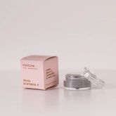 routine Moon Sisters mini deodorant - pink cardboard box beside open glass jar showing grey cream deodorant - floral natural formula with rose neroli lavender and vetiver