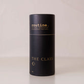 Routine The Class Natural Deodorant - black cardboard tube packaging with gold lettering showing 50g natural deodorant stick - luxury aluminum-free formula with orris and jasmine scent for sensitive skin