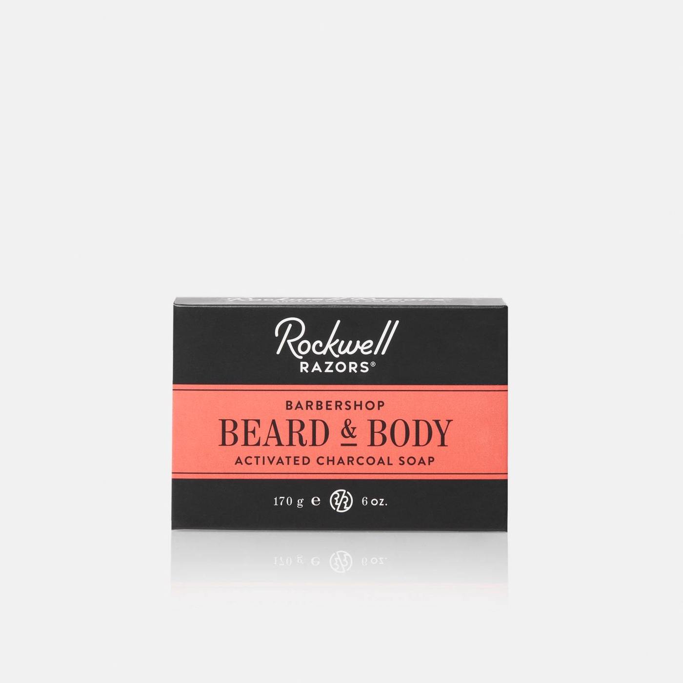 Rockwell Razors Barbershop Beard and Body Activated Charcoal Soap in black and coral packaging box displaying 170g 6oz size on white background