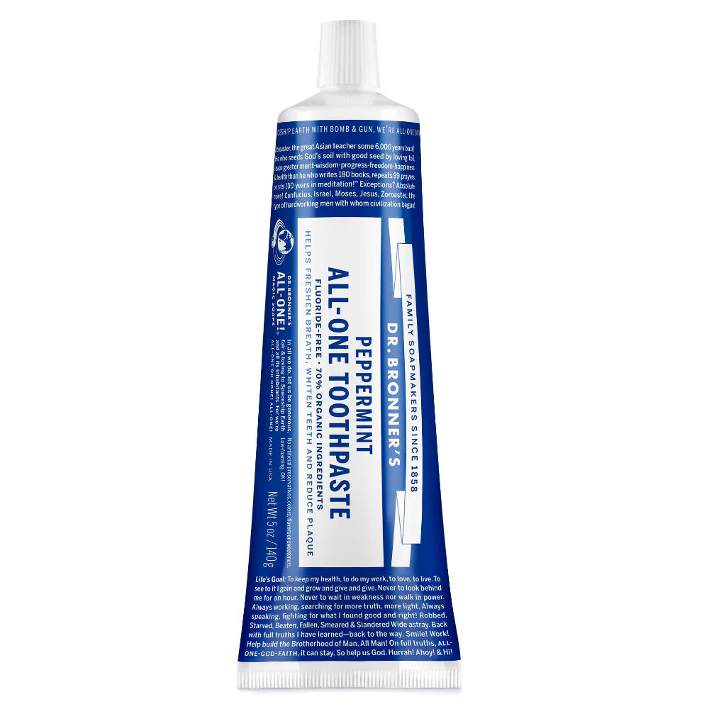 Dr. Bronner's peppermint toothpaste tube on a white background