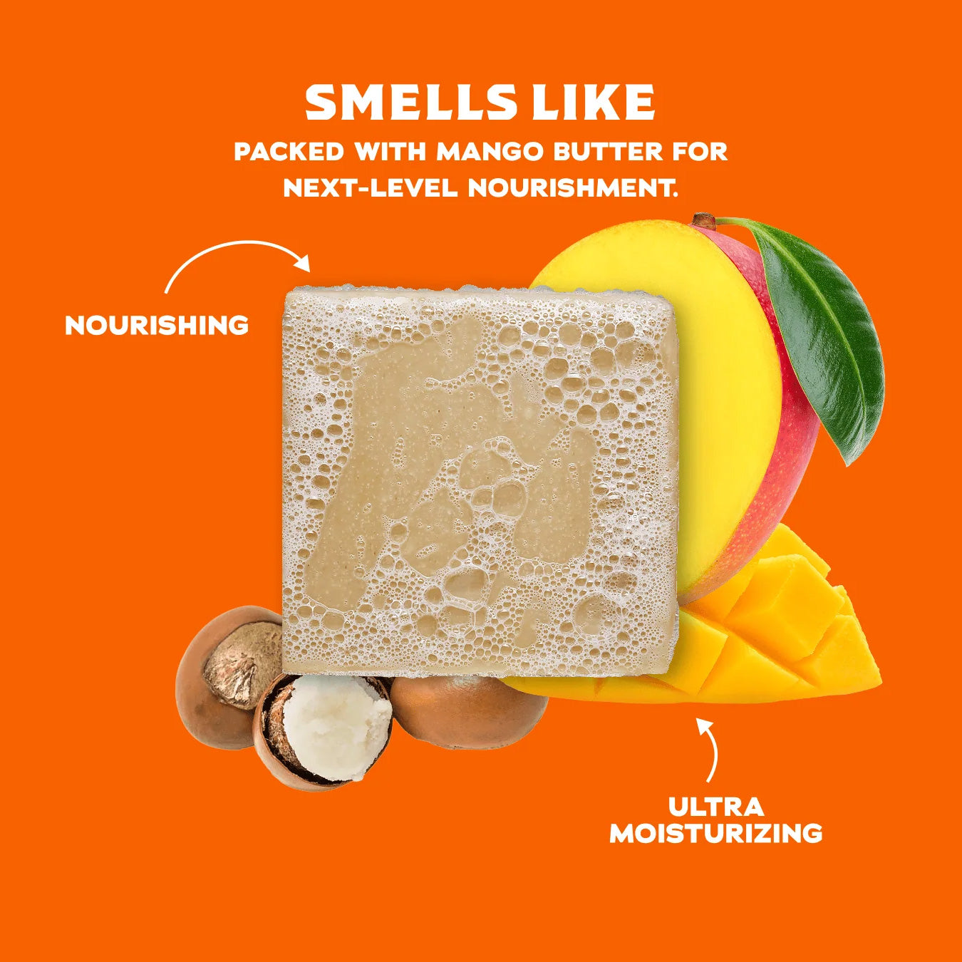Dr. Squatch Total Moisture bar soap with rich lather on bright orange background surrounded by natural ingredients including shea butter halves, fresh mango slices, and coconut, illustrating nourishing and ultra-moisturizing benefits
