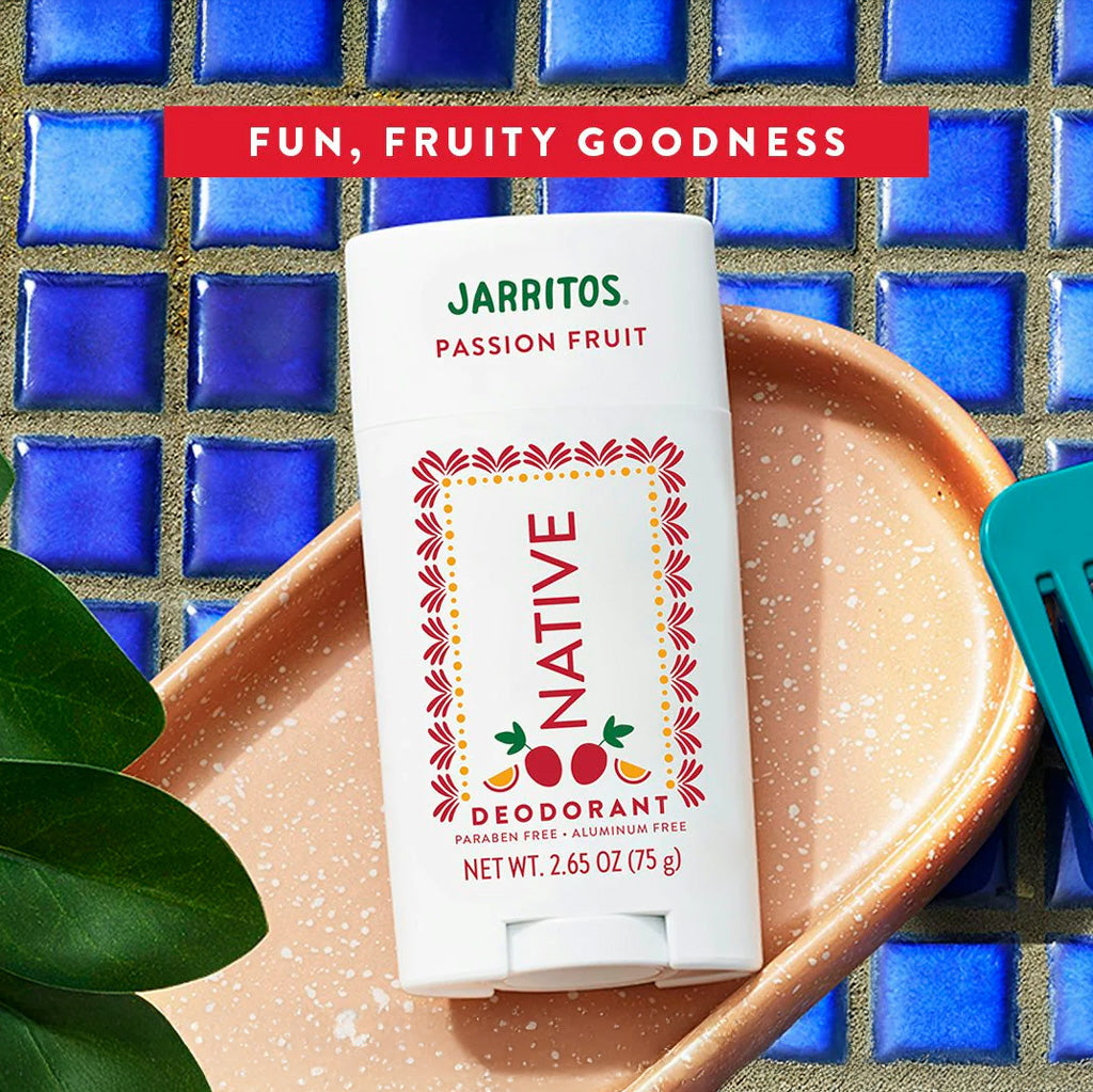 Native Jarritos Passion Fruit deodorant on a ceramic plate with a blue tiled background