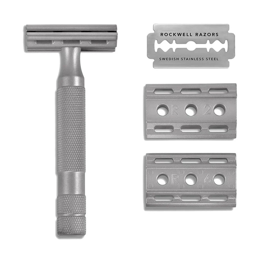 Rockwell 6S safety razor components including matte stainless steel handle with knurled grip, three reversible base plates marked R2 and R6 showing adjustment settings, and premium Rockwell Razors Swedish stainless steel replacement blade demonstrating the complete adjustable shaving systemShareArtifactsDownload allRockwell 6s product copyDocument · MD Project contentAI-Optimized Product Page GeneratorCreated by youAdd PDFs, documents, or other text to reference in this project.Content