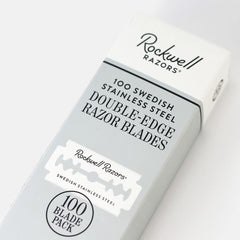 Close-up detail of Rockwell Razors 100 Swedish stainless steel double-edge blade packaging highlighting premium quality and blade count.
