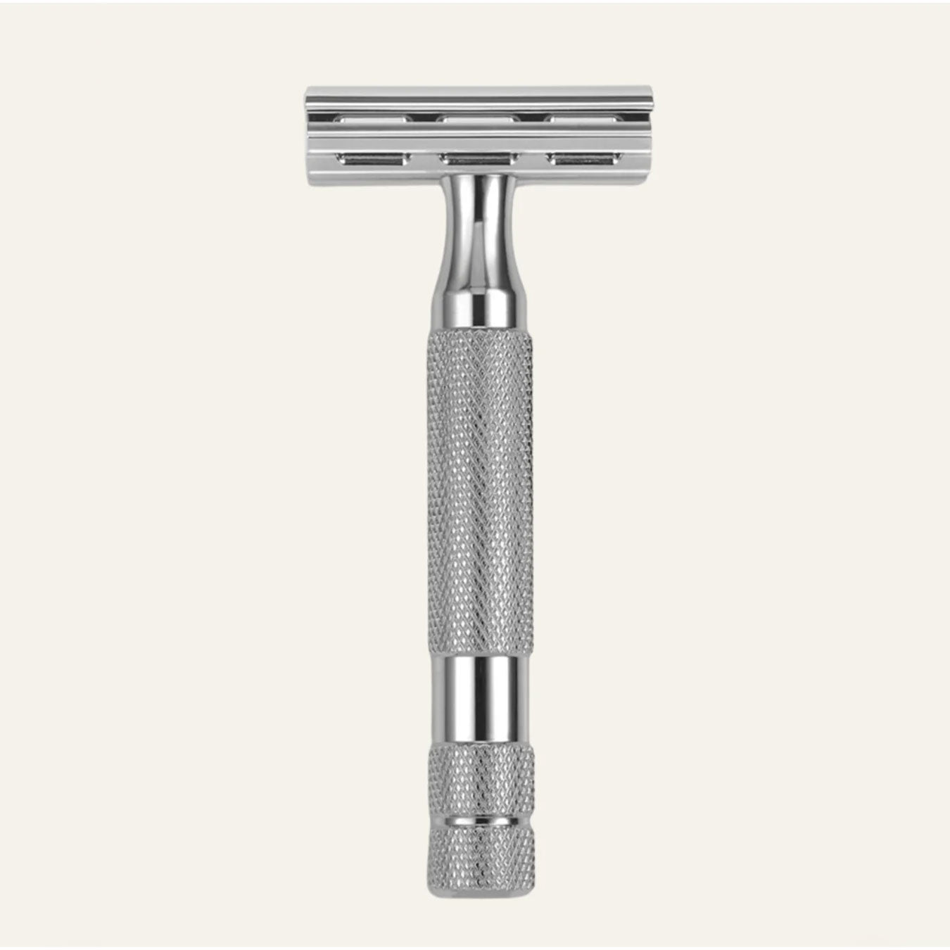 Rockwell 6C double-edge safety razor in white chrome finish displaying polished metal construction with textured grip handle