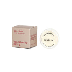 Routine Blackberry Betty mini deodorant with opened jar displaying "blackberry betty" and "routine NATURAL DEODORANT" text on white lid against clean background