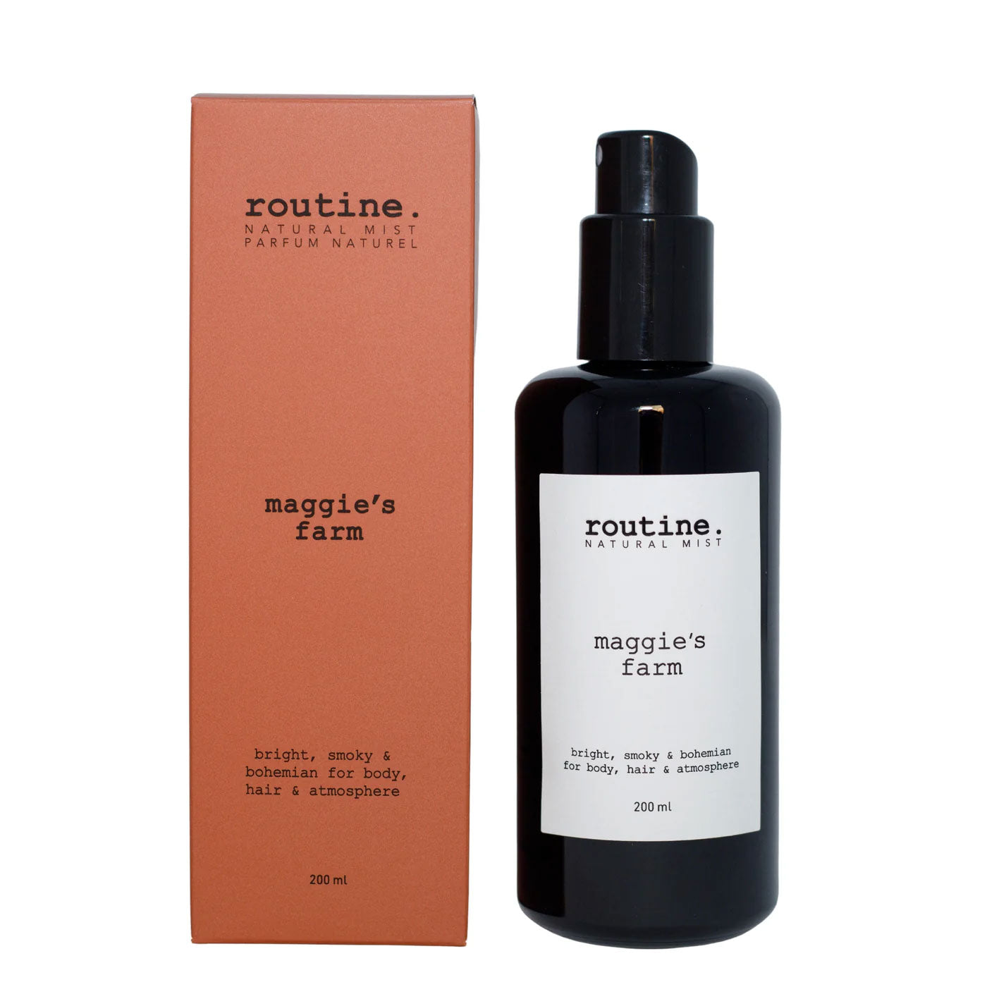 Routine Maggie's Farm Natural Mist - detailed product view showing black spray bottle with white label next to coral packaging