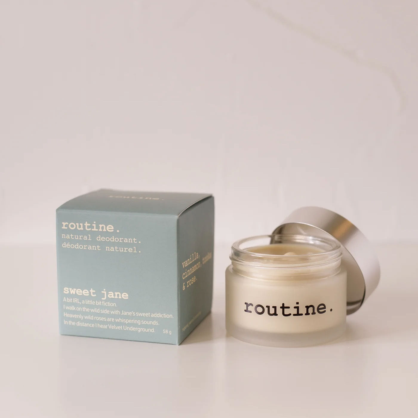 routine Sweet Jane natural deodorant jar with sage green packaging box showing product details - aluminum-free cream formula in glass container for sensitive skin