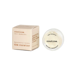 routine The Curator natural deodorant mini - closed glass jar with clear lid showing baking soda-free sensitive skin formula details