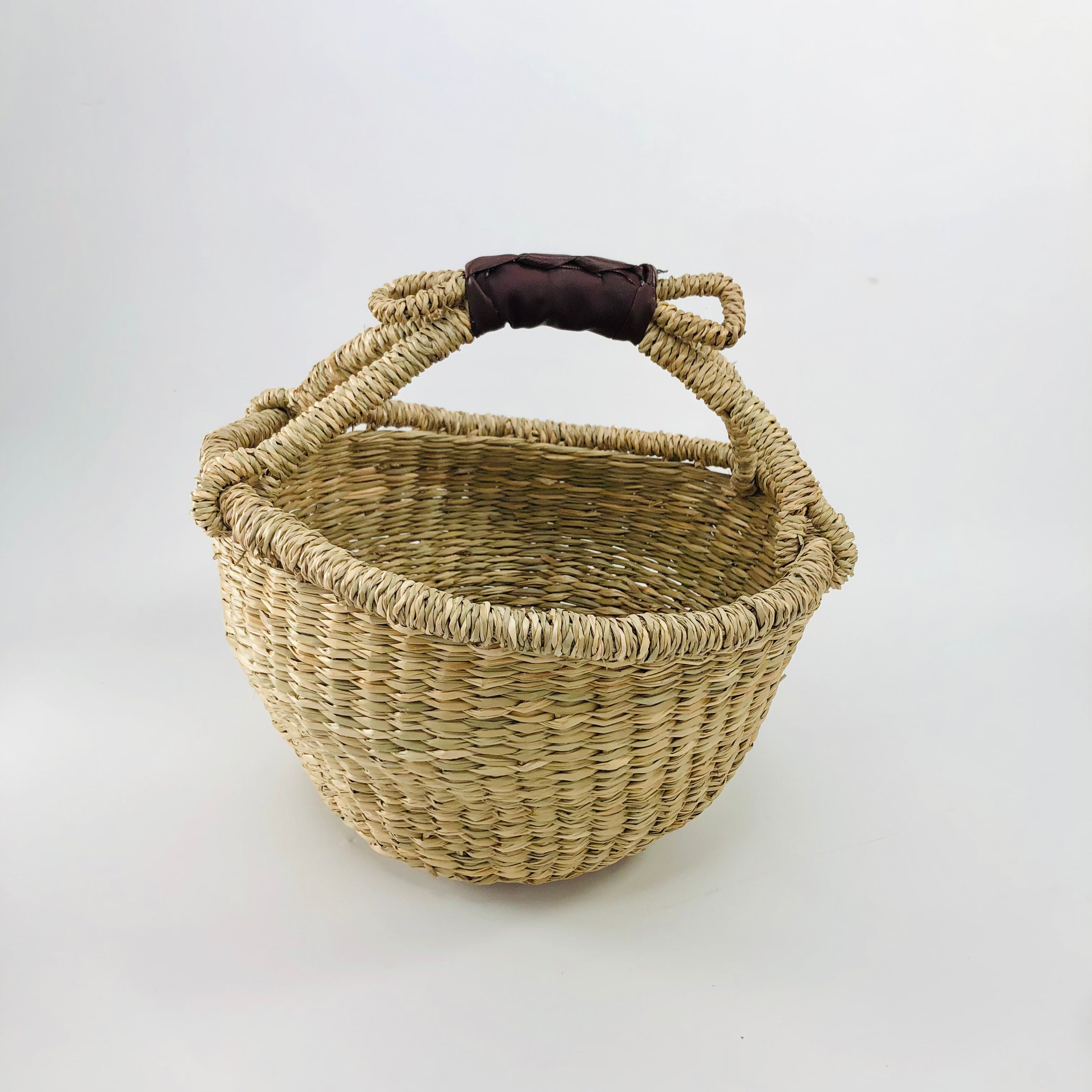 handwoven natural seagrass boho bolga basket